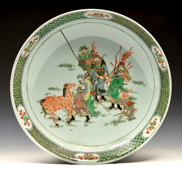 Appraisal: A LARGE CHINESE FAMILLE VERTE PORCELAIN CHARGER the centre painted