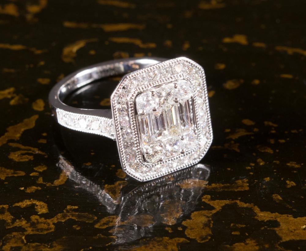 Appraisal: DIAMOND AND EIGHTEEN KARAT WHITE GOLD RING The k white