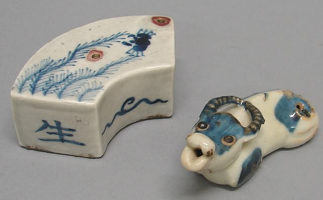 Appraisal: Blue and white water buffaloes on plinth l S