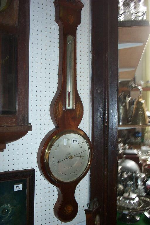 Appraisal: A Georgian mahogany wheel barometer with shell inlaid detail silvered