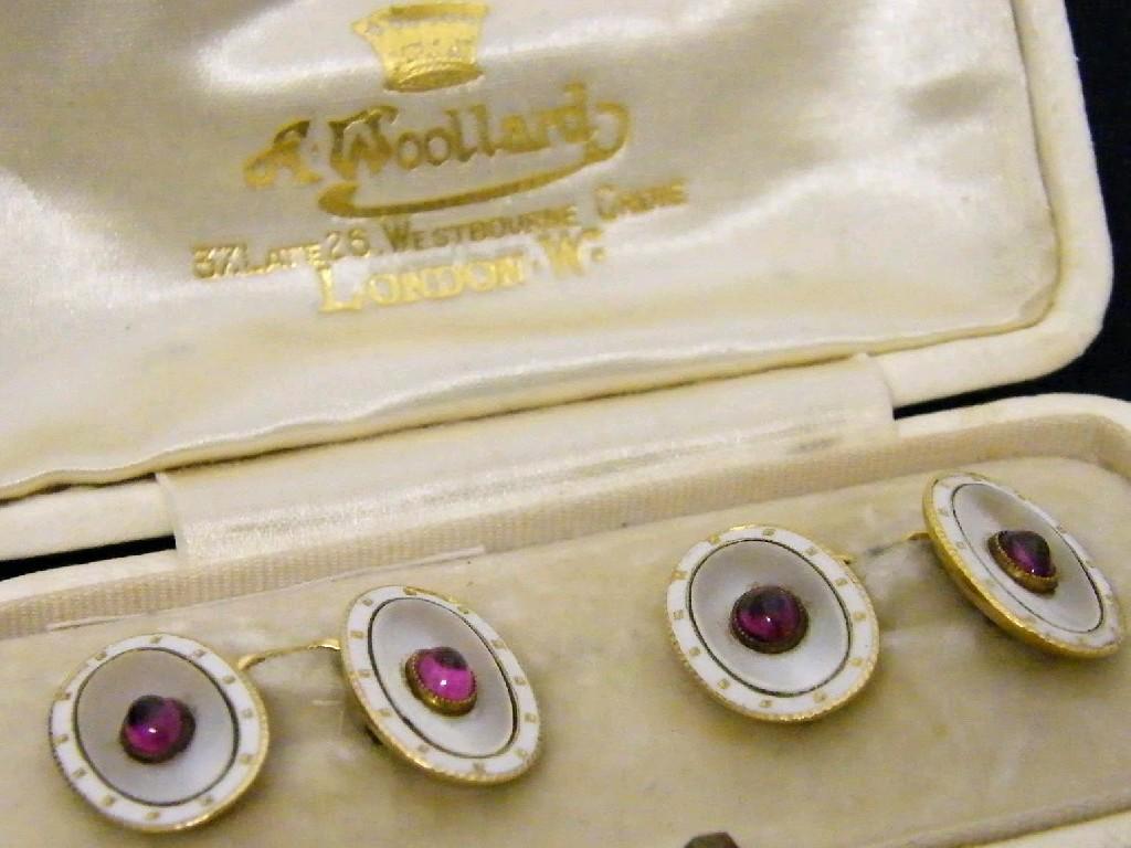 Appraisal: Pair of ct oval enamel cufflinks set with ruby coloured