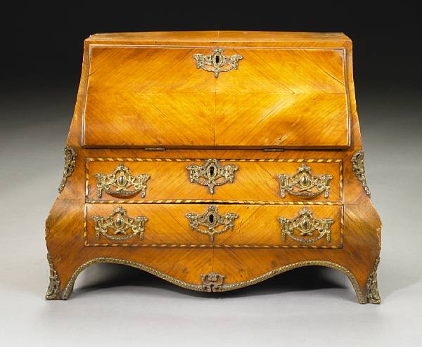 Appraisal: A Dutch Rococo miniature gilt bronze mounted inlaid walnut desk