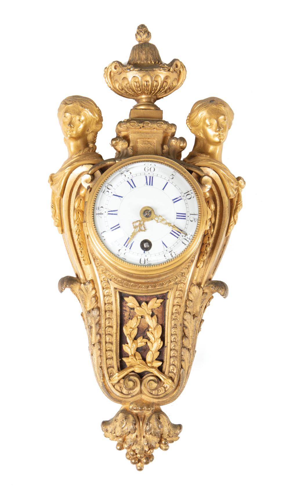 Appraisal: Diminutive French Bronze Cartel Clock c urn finial dial flanked