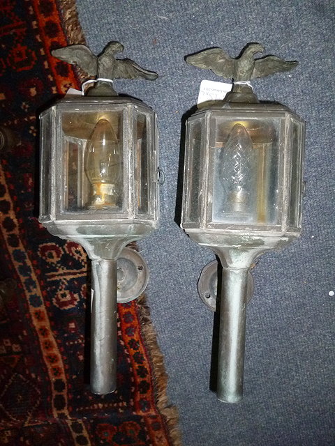 Appraisal: A PAIR OF COPPER WALL MOUNTED OUTDOOR ELECTRIC LANTERNS each