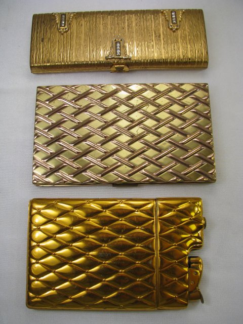 Appraisal: Vintage Evans gold tone cigarette cases One has a textured