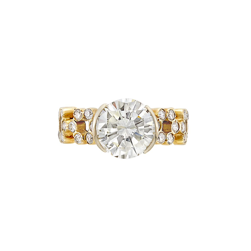 Appraisal: Gold and Diamond Band Ring One round diamond ap cts