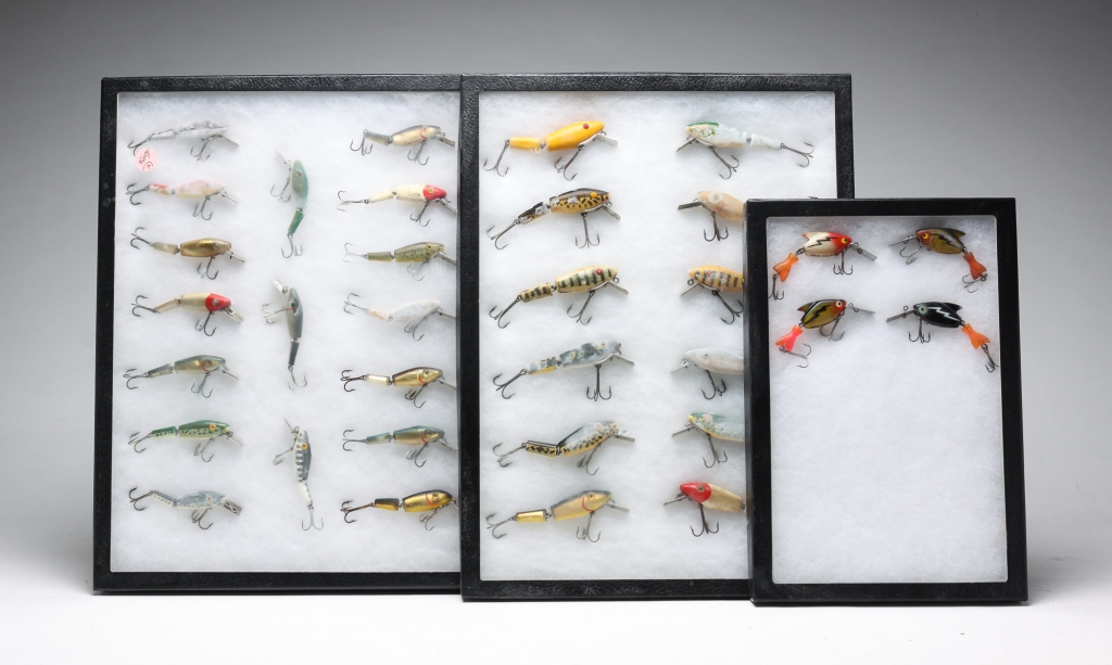 Appraisal: ASSORTED FISHING LURES IN DISPLAY CASES American third quarter- th