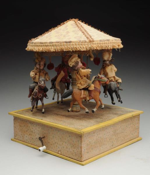 Appraisal: Musical Mechanical Carousel Toy Four bisque-headed children go back and