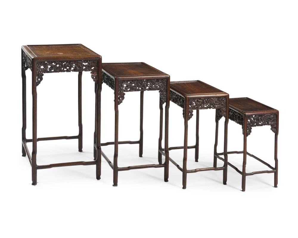 Appraisal: A set of Chinese carved wood nesting tables th Century