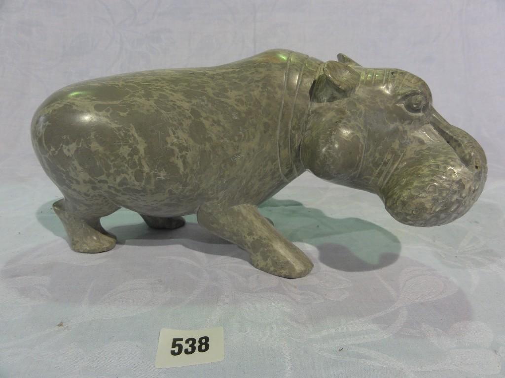 Appraisal: A carved soapstone figure of a hippopotamus