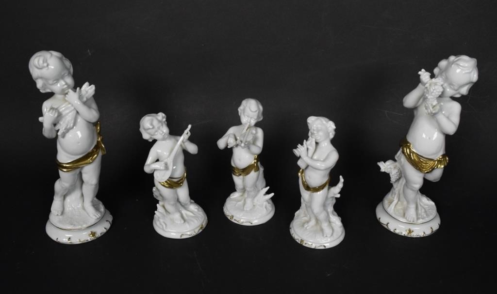 Appraisal: GROUPING OF PORCELAIN CHERUBSGrouping of porcelain cherubs two larger ones