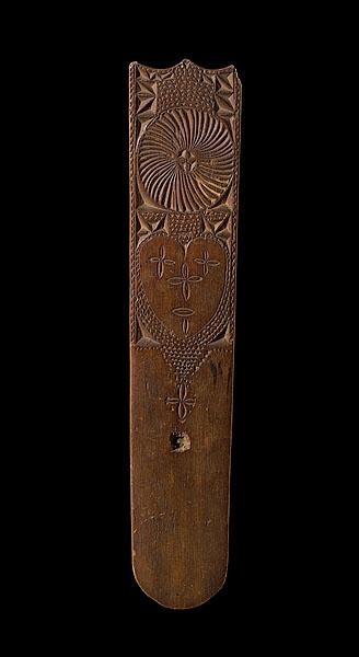 Appraisal: CARVED WOODEN BUSK DECORATED WITH HEART American ca Carved wooden