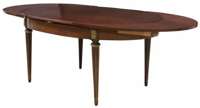 Appraisal: French Louis XVI style mahogany extension table th c having