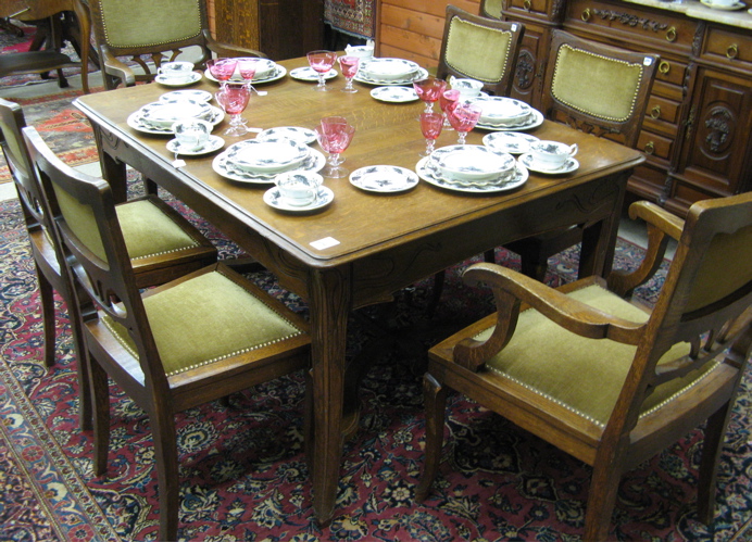 Appraisal: ART NOUVEAU OAK DINING TABLE AND CHAIR SET Continental c