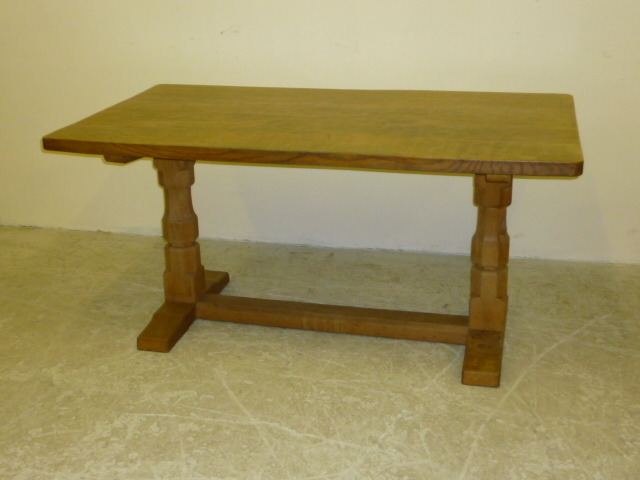 Appraisal: AN ADZED OAK REFECTORY TABLE by Robert Mouseman Thompson the