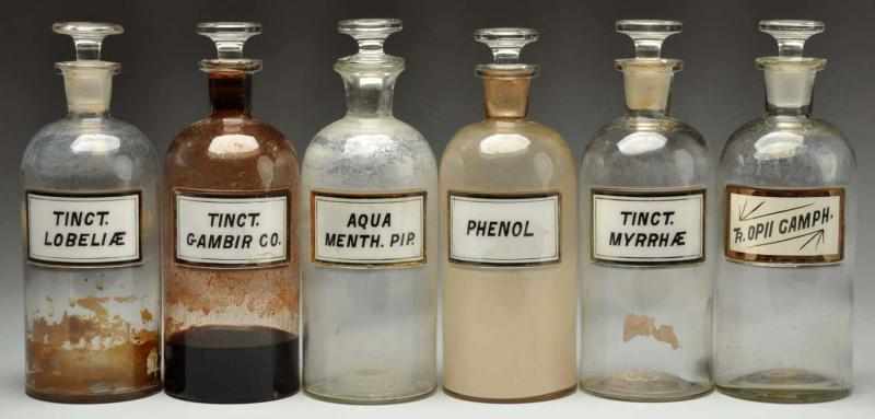 Appraisal: Lot of Apothecary Pharmacy Bottles Description With reverse painted glass