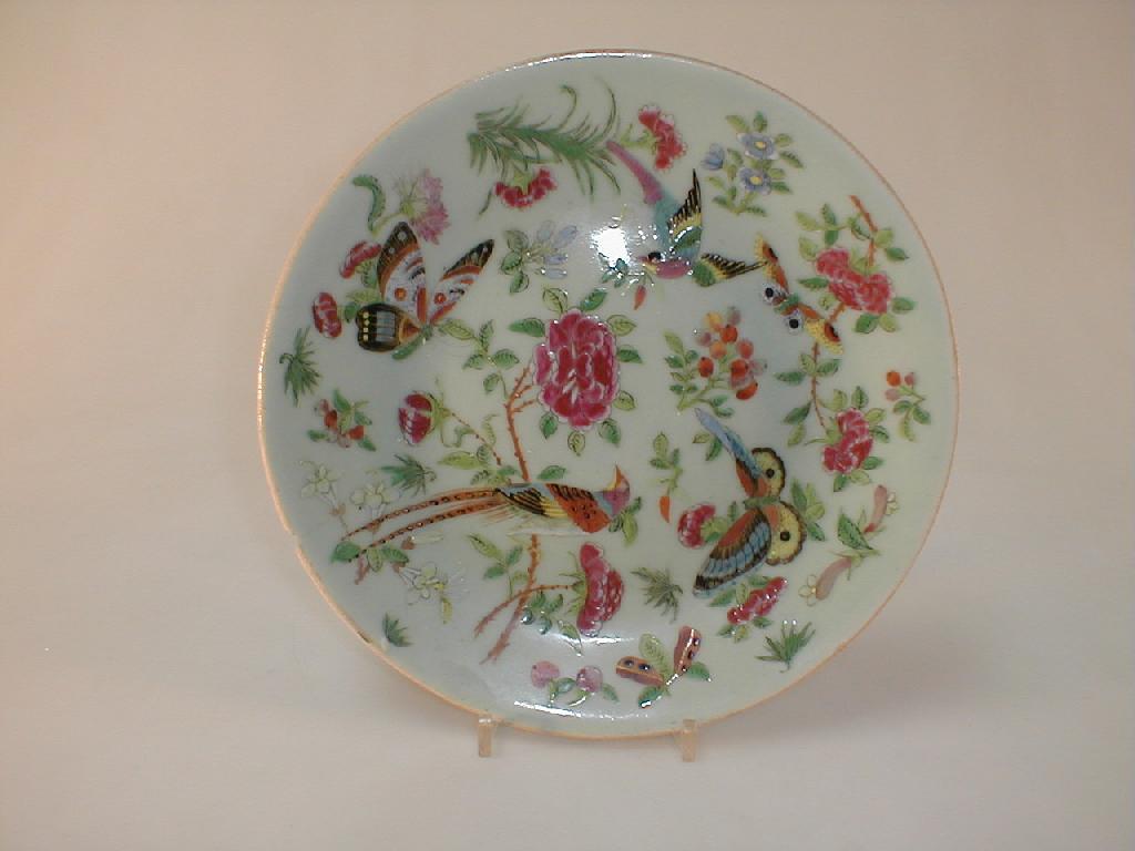 Appraisal: A Chinese celadon plate enamelled with birds butterflies and flowers