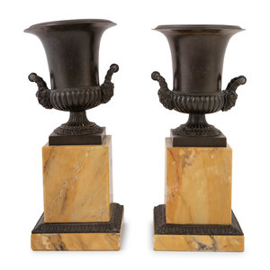 Appraisal: A Pair of Grand Tour Bronze and Marble Urns Late