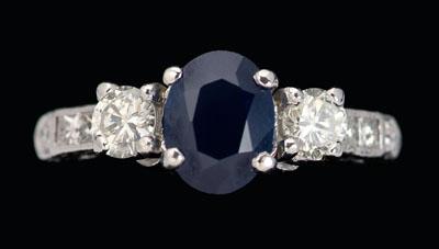 Appraisal: Sapphire diamond platinum ring central oval blue sapphire estimated weight