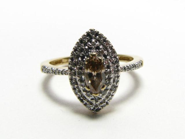 Appraisal: Lady's k yellow gold ring with canary marquise diamond and