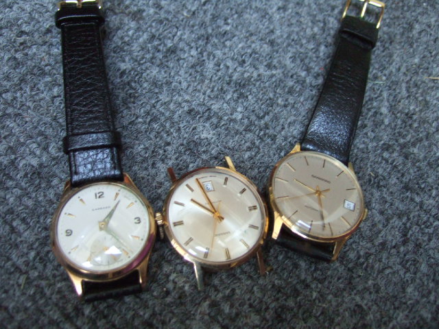 Appraisal: Two gentleman's ct gold circular cased Garrard Automatic wristwatches each