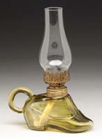 Appraisal: RARE ATTERBURY SHOE MINI LAMP S - Amber glass shoe