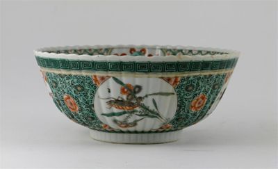 Appraisal: A Chinese famille verte bowl moulded with ribs and painted