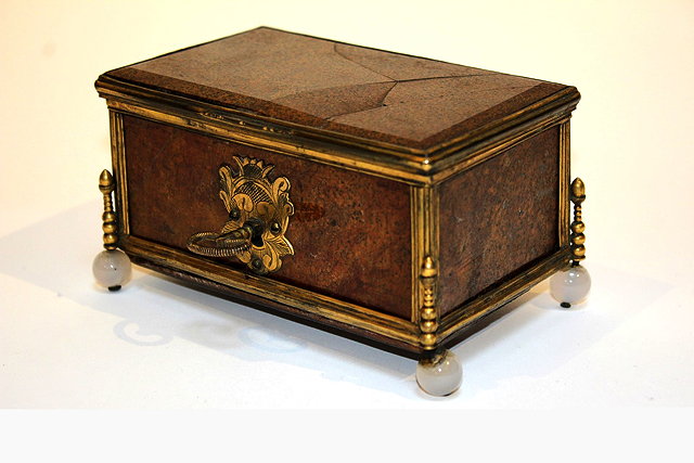 Appraisal: A CONTINENTAL HARDSTONE AND GILT METAL MOUNTED CASKET with engraved