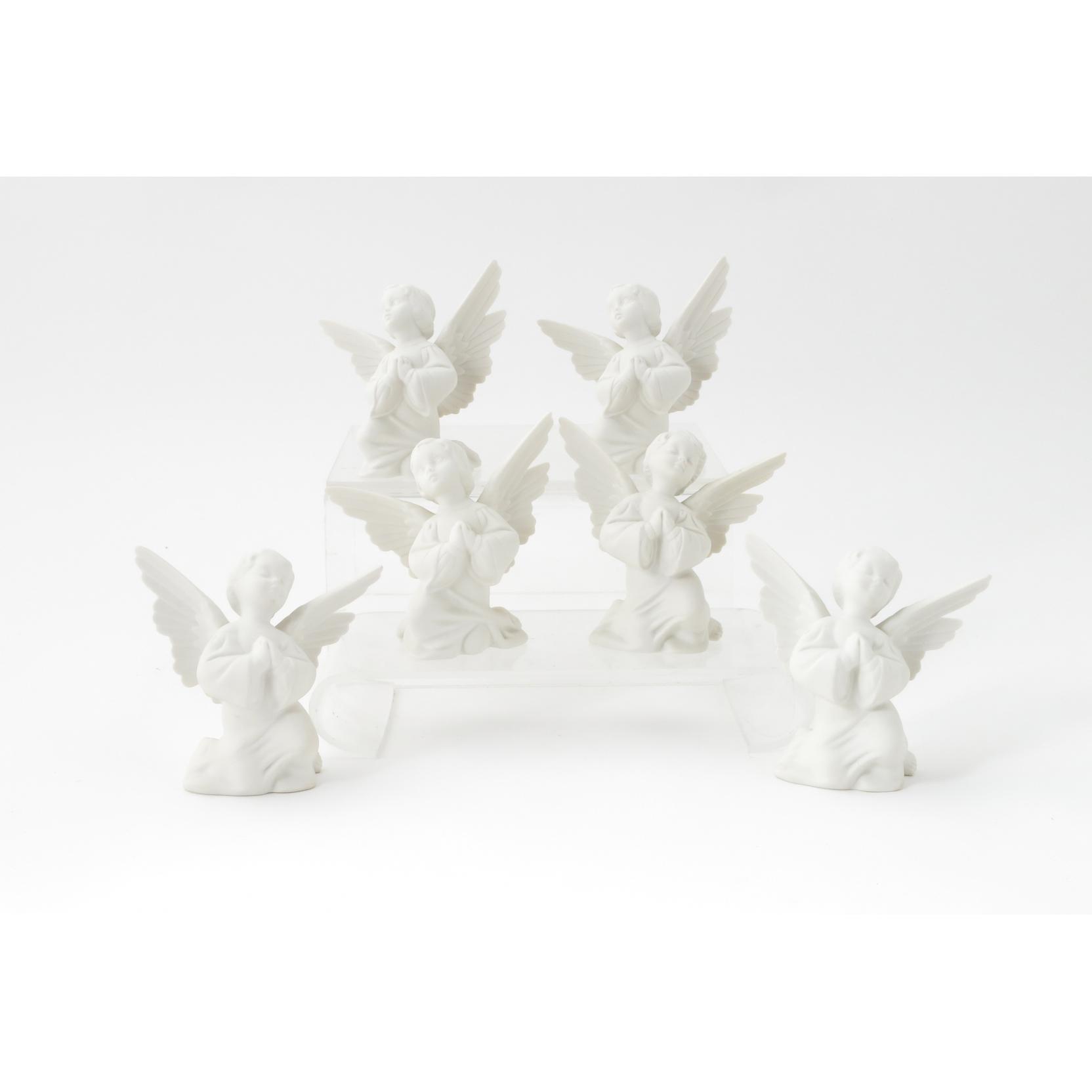 Appraisal: Boehm Porcelain Angel Grouping white bisque figures to include kneeling