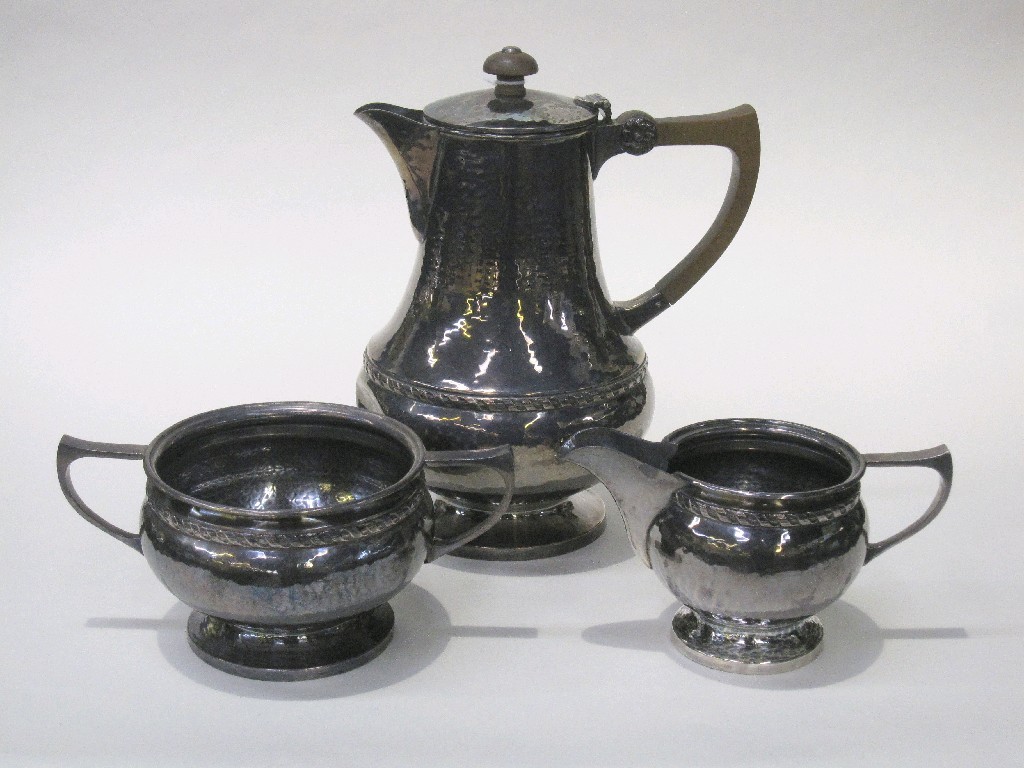 Appraisal: Arts and Crafts hammered silver three piece coffee service by