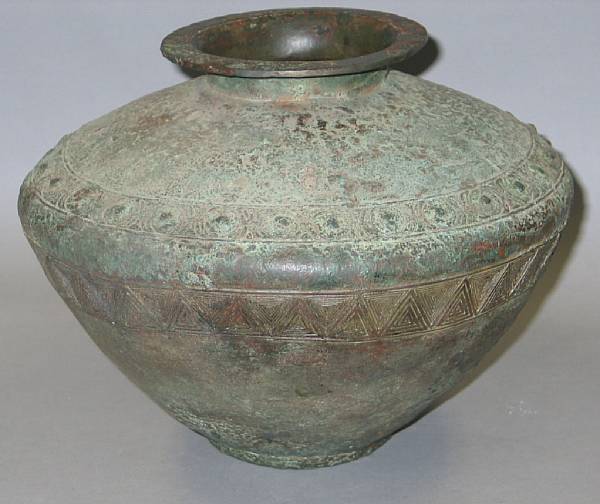 Appraisal: An archaistic cast bronze vase of lei form Finished with