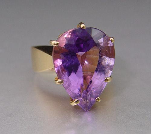 Appraisal: CT PEAR SHAPE AMETHYST RING K yellow gold ring contains