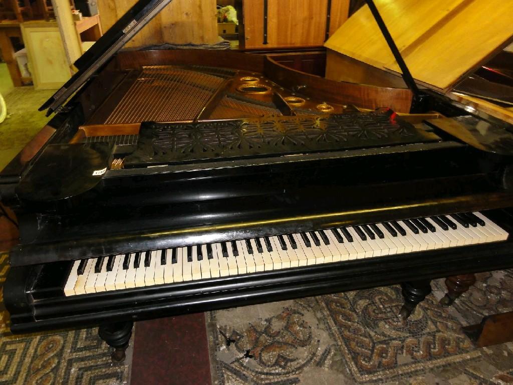 Appraisal: A Bechstein grand piano with ebonised case and pierced folding