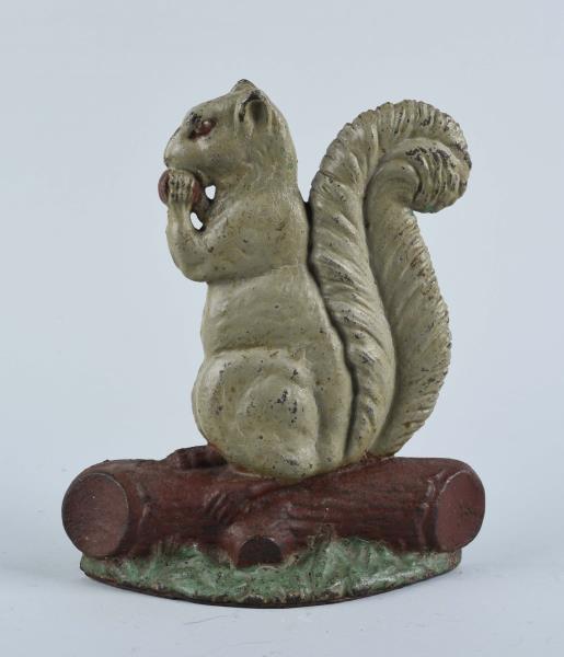 Appraisal: Cast Iron Squirrel With Nut Doorstop Depicts squirrel on log