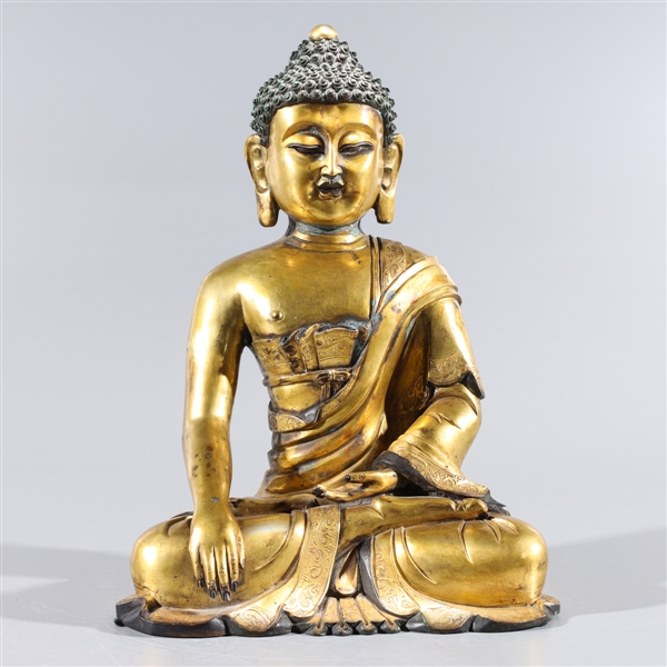 Appraisal: Antique Chinese gilt bronze Buddha with intricately incised details to