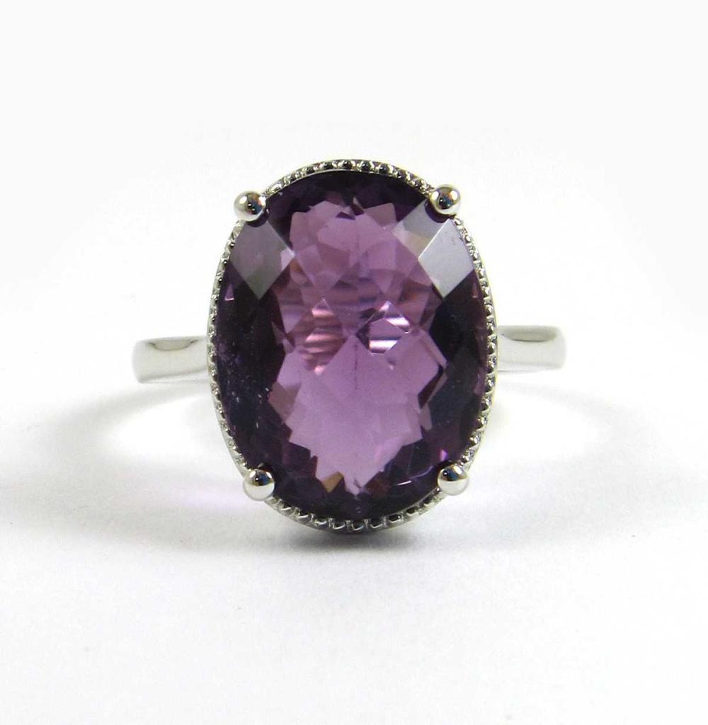 Appraisal: AMETHYST SOLITAIRE RING Oval-cut purple amethyst cts K white gold