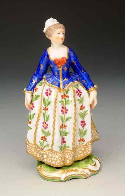 Appraisal: A DERBY PORCELAIN FIGURE of a girl with blue chemise