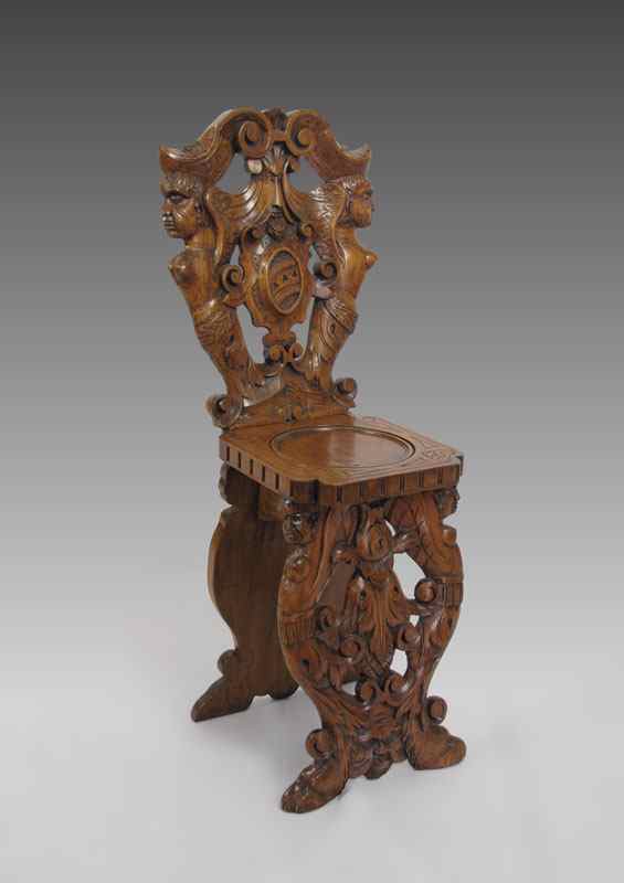 Appraisal: GERMAN FIGURAL CARVED SIDE CHAIR Carved with figures angel and