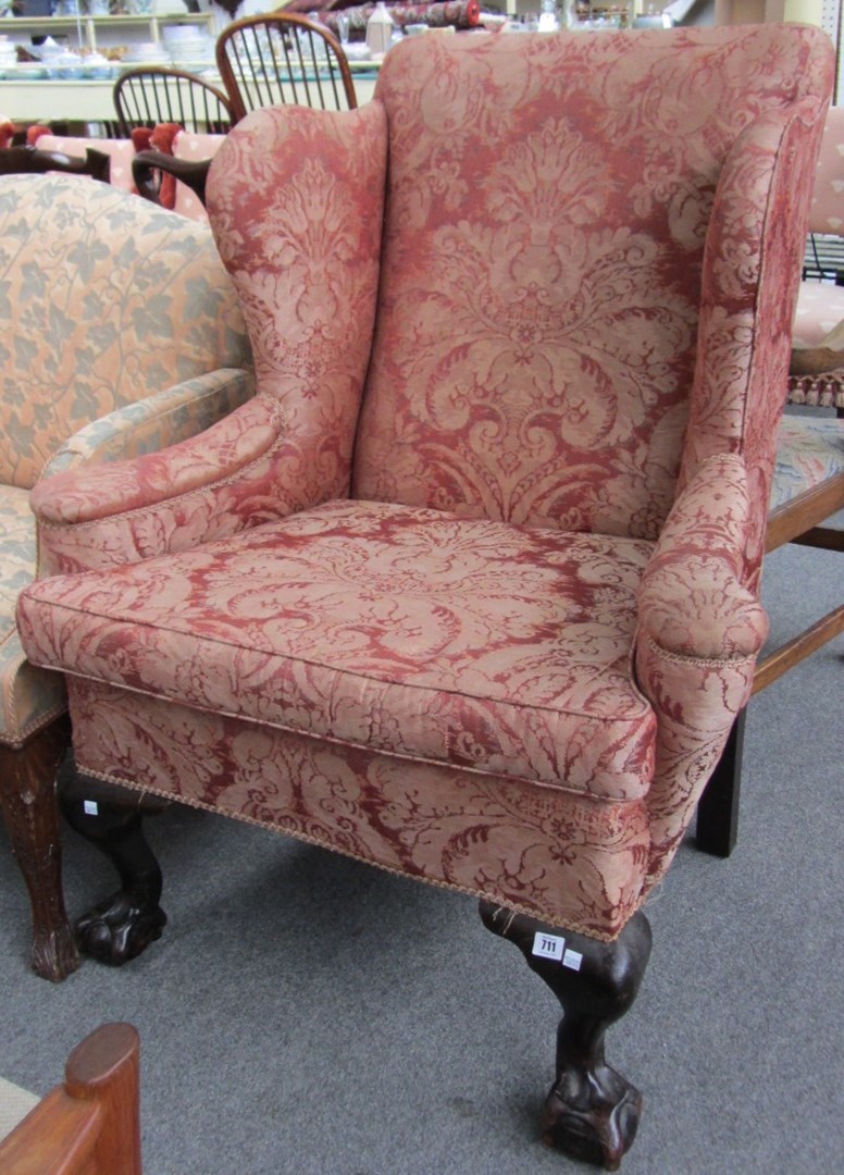 Appraisal: An th century style wingback armchair on cabriole supports and