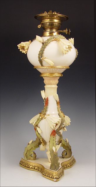 Appraisal: ENGLISH STAFFORDSHIRE MOORE PORCELAIN OIL LAMP CA - Decorated with