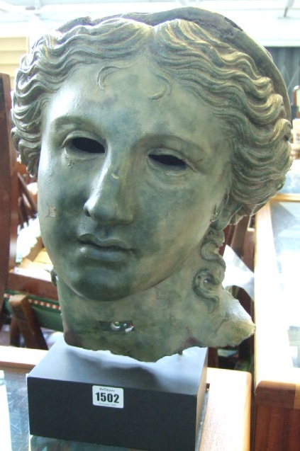 Appraisal: A fibre glass bust of a Grecian God on a