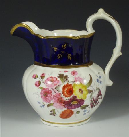 Appraisal: An early th century floral decorated jug with blue and