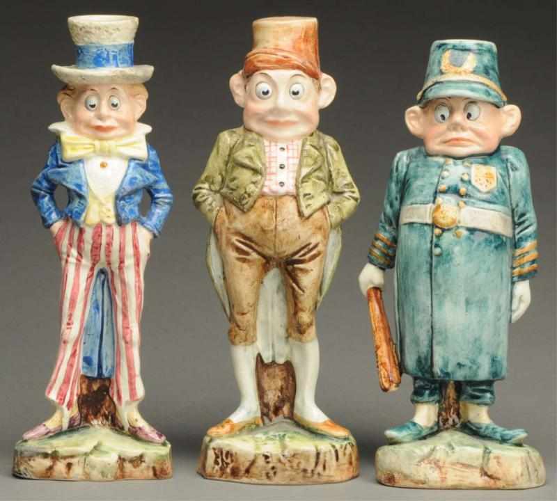 Appraisal: Lot of Majolica Brownie Figures Includes Uncle Sam Policeman and