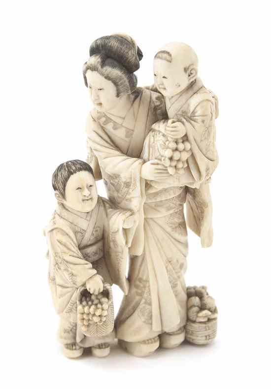 Appraisal: An Ivory Okimono of a Woman and Two Children the