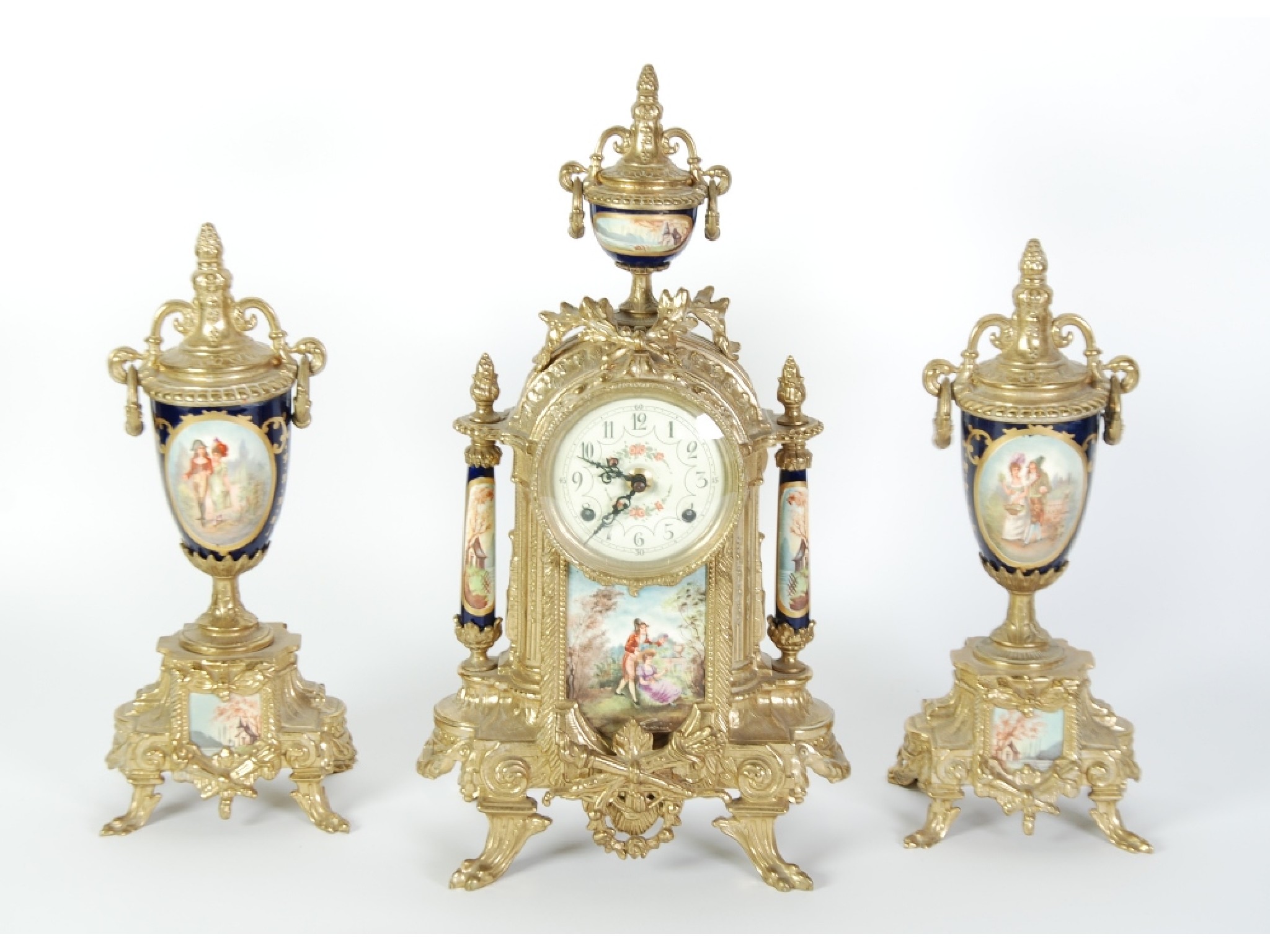 Appraisal: TWENTIETH CENTURY GILT METAL AND PORCELAIN MOUNTED THREE PIECE CLOCK