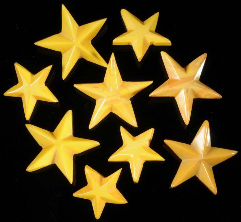 Appraisal: Lot of Bakelite Marbleized Cream Star Buttons Description Includes two