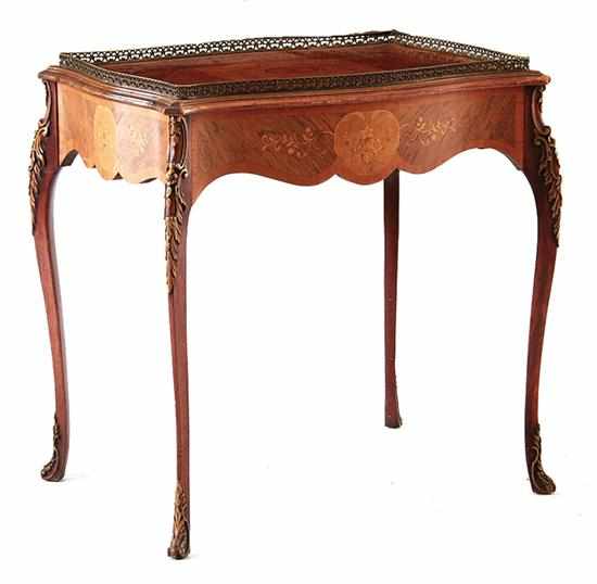 Appraisal: Louis XV style carved and inlaid mahogany tea table circa