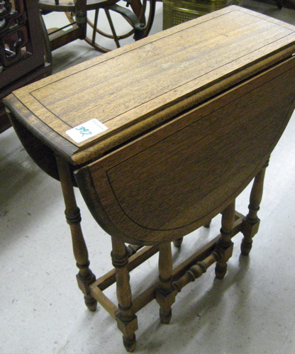 Appraisal: PETITE DROP-LEAF TEA TABLE American c 's the demilune side