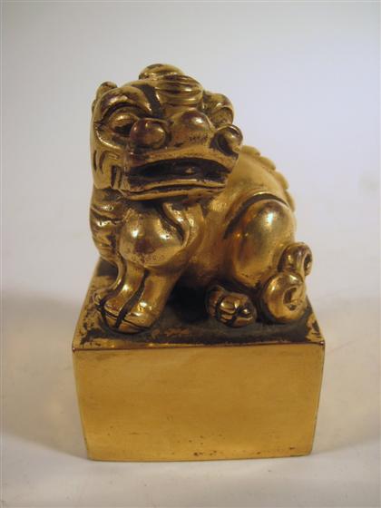 Appraisal: Chinese gilt bronze sealStylized fu lion figure atop square pedestal