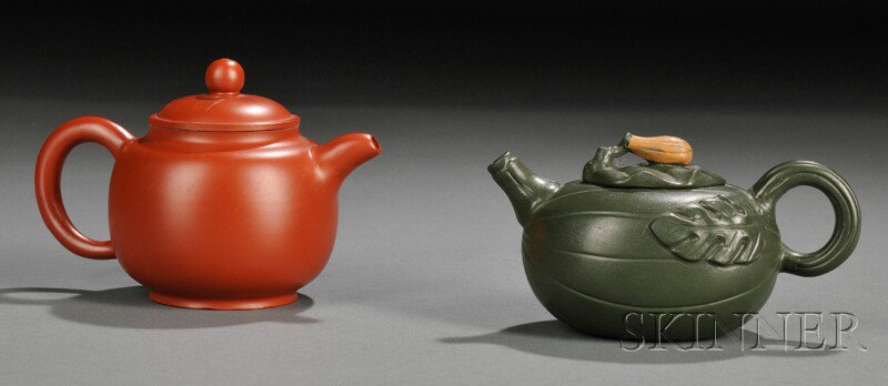 Appraisal: Two Yixing Teapots China one red ovoid with short spout